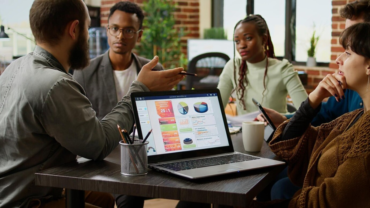 team sitting in a meeting